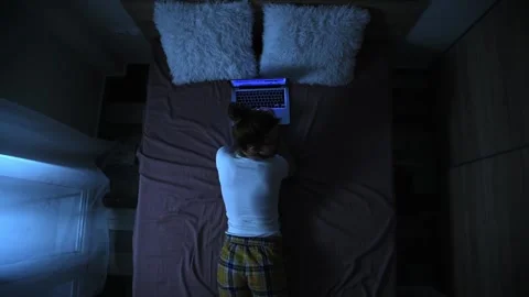 Woman in bed using laptop. Stock Footage 147104228