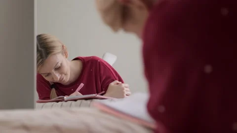 Woman in bed writing in diary. Stock-Footage 170239267