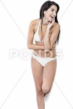 Woman in bikini smiling Stock Photos