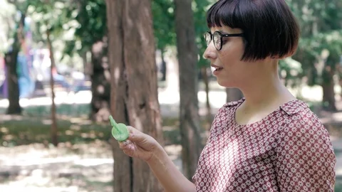 Woman blowing bubbles Stock Footage 110862601
