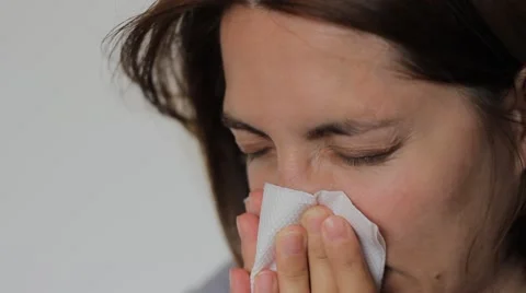 Woman is Blowing Nose Stock Footage