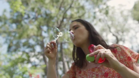 Woman Blows Bubbles Stock Footage 182649465