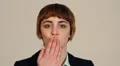 Woman blows kiss at camera using hand HD Footage