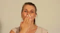 Woman blows kiss at camera using hand HD Footage