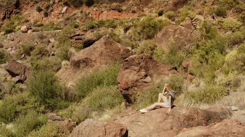 Woman on the boulder Video stock 106283152