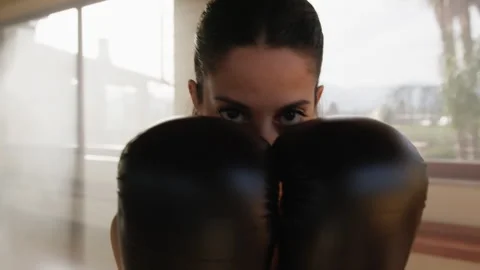 Woman Boxer In The Guard Position While Training Stock Footage 276127811