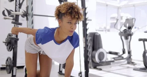 Woman breathing while working out Stock Footage