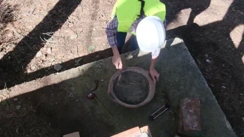 Woman bricklayer works in construction using and preparing cement Stock Footage 270455681