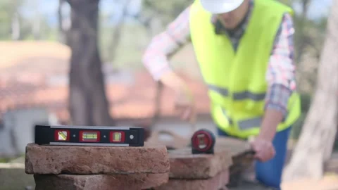 Woman bricklayer works in construction using and preparing cement Vídeos de archivo 270456266