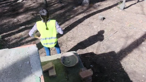 Woman bricklayer works in construction using and preparing cement Vídeos de archivo 270456647