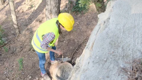 Woman bricklayer works in construction using and preparing cement Stock Footage 270457641