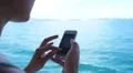 Woman Browsing Internet Pages in Smartphone. Slow Motion. HD Footage