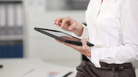 Woman browsing using digital tablet Stock-Footage 25210609