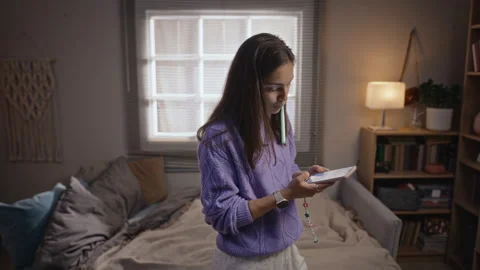 Woman Brushing Teeth While Addicted to Smartphone Screen Stock Footage 344127306