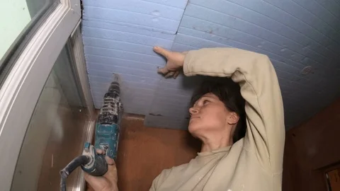 Woman builder with construction tools. Video stock 120287285