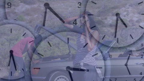 Woman calling for help over broken-down car with clock overlay animation Stock Footage 305837669