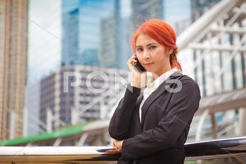 Woman calling on the phone Stock Photos