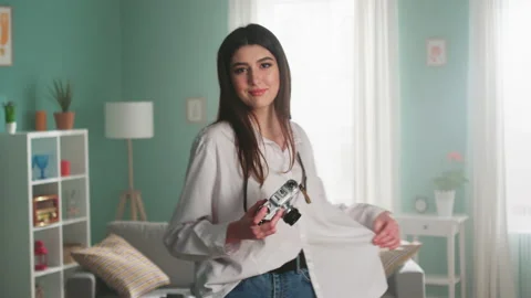 Woman With Camera Is Dancing Stock Footage 165346728