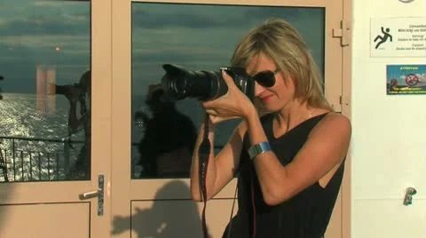 Woman with a camera Stock Footage 9666838