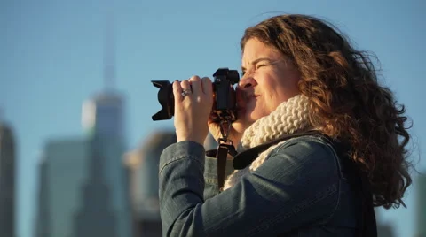 A woman with camera Stock Footage 56863788