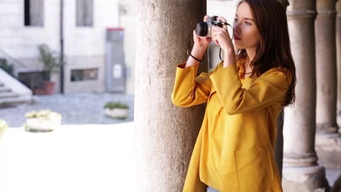 Woman with camera Stock Footage 106095971