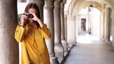 Woman with camera Stock Footage 106096039
