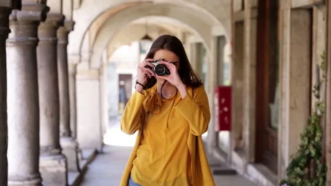 Woman with camera Stock Footage 106096046