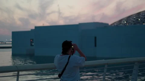 Woman with camera Stock Footage 326420795