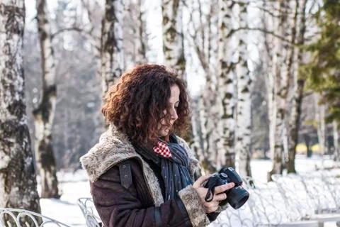 Woman With Camera Stock Photos