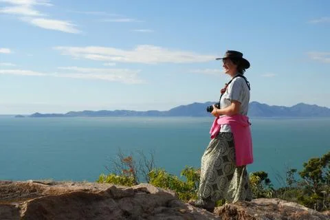 Woman with camera Stock Photos