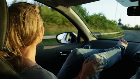 Woman in car Stock Footage