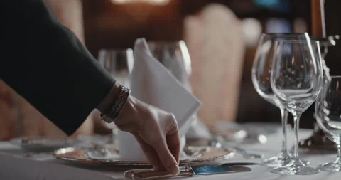 Woman carefully setting an upscale table Stock Footage 254887326