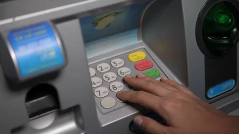 Woman carefully types PIN code on cash machine keypad Stock Footage 285392335