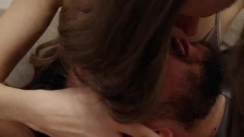 Woman caressing man's head lying on her lap Stock Footage 305722079