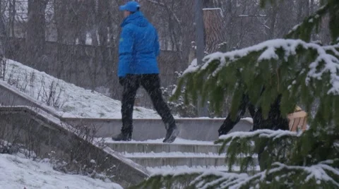 Woman is Carrying a Sleigh Climbing up the Stairs Kids Riding on a Sleigh Down Stock Footage 59132227