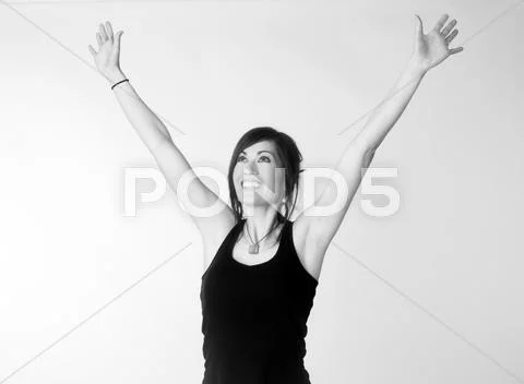 Woman Celebrates Winning Attitude Arms Outstretched Reaching Upward Stock Photos
