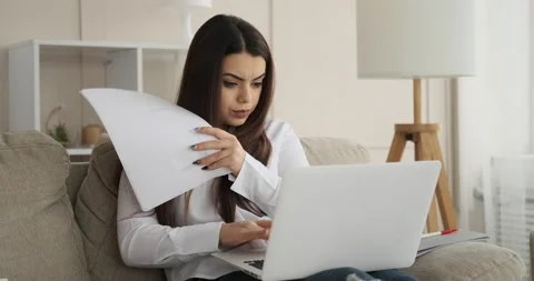 Woman celebrating on finding a solution to her problem Stock Footage 147379114