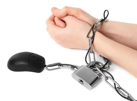 Woman chained to computer mouse on white background, closeup. Internet addict Stock Photos
