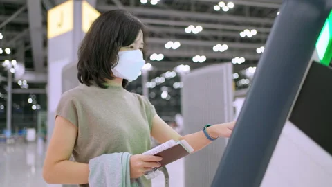 Woman check-in with automatic machine Stock Footage 172359079