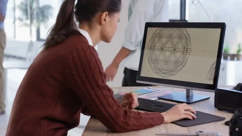 Woman checking 3D model and comparing it to its sketch at modern office Stock Footage 106747938