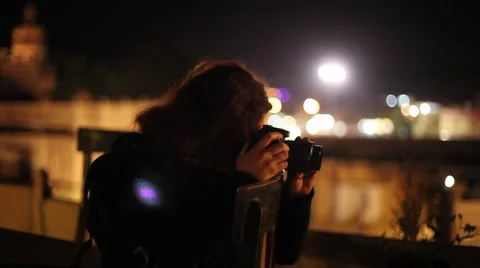 Woman checking camera at the rooftop of a indian castle fort Stock Footage 46467307