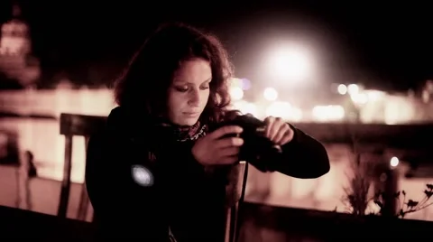 Woman checking camera at the rooftop of a indian castle fort Stock Footage 46467594