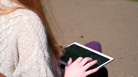 Woman Checking Emails In Park Stock Footage 90736662