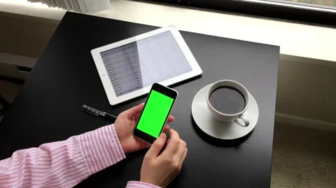 Woman checking global exchange rate on iphone Stock Footage 55537704