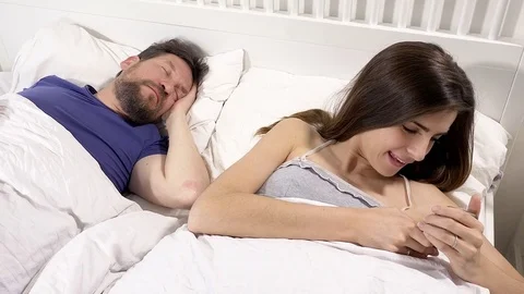 480px x 270px - Woman checking that husband is sleeping ... | Stock Video | Pond5