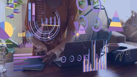 Woman checking laptop opening notebook and writing while data charts shifting Stock Footage 334703534