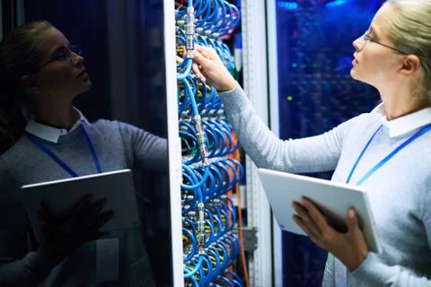 Woman Checking Server Network Foto stock