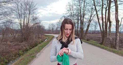 Woman checking smart watch  Stock Footage 146108875