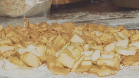 Woman Chef Baking Apple Strudel. Female Hands Sprinkle Dough with Brown Sugar Stock Footage 106062853
