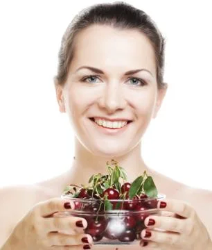 Woman with cherries over white Stock Photos